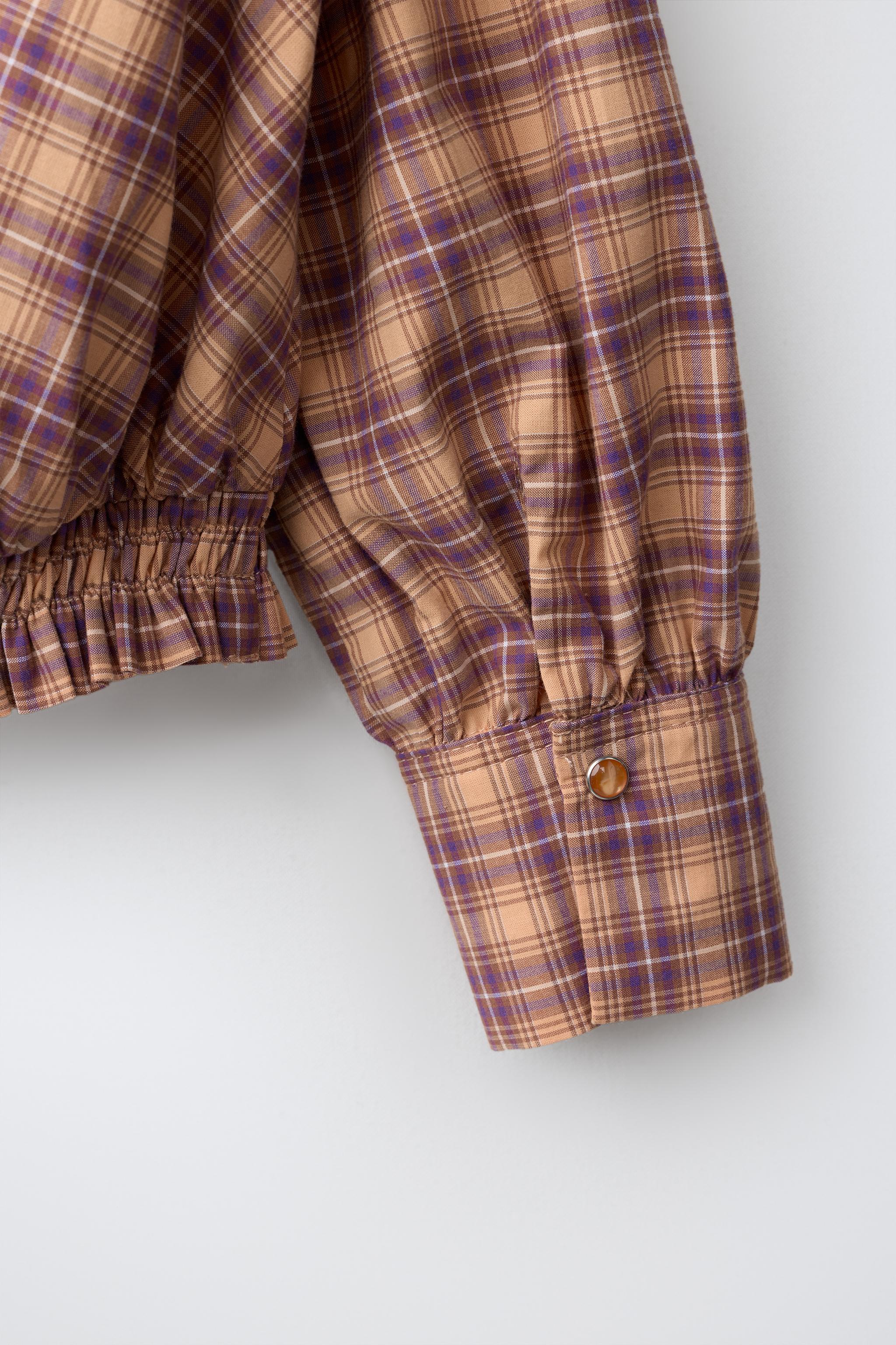 CHEMISE À COL MONTANT ÉLASTIQUÉ